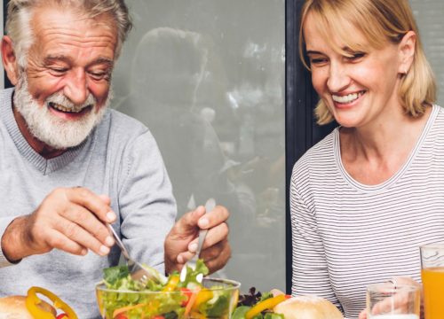 Older couple eating a meal together