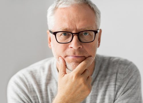 Photo of an older man wearing glasses